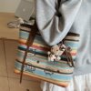 Super popular rainbow woven bag women's 2026 new women's bag commuting versatile single shoulder large capacity straw tote bag