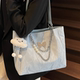 High-end single shoulder large bag women's 2026 new fashion casual large capacity niche design commuter tote bag