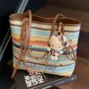 Super popular rainbow woven bag women's 2026 new women's bag commuting versatile single shoulder large capacity straw tote bag