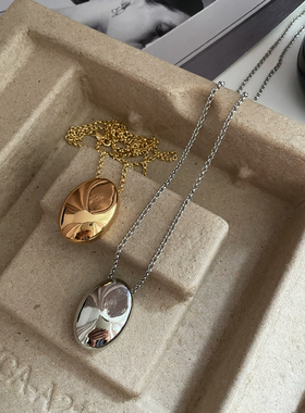 黄铜镀金女蛋形吊坠毛衣链