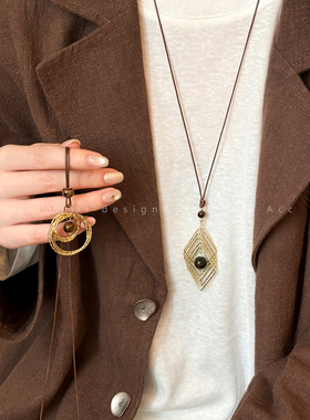 超闪金色虎眼石吊坠项链女轻奢高级感秋冬复古毛衣链百搭长款配饰