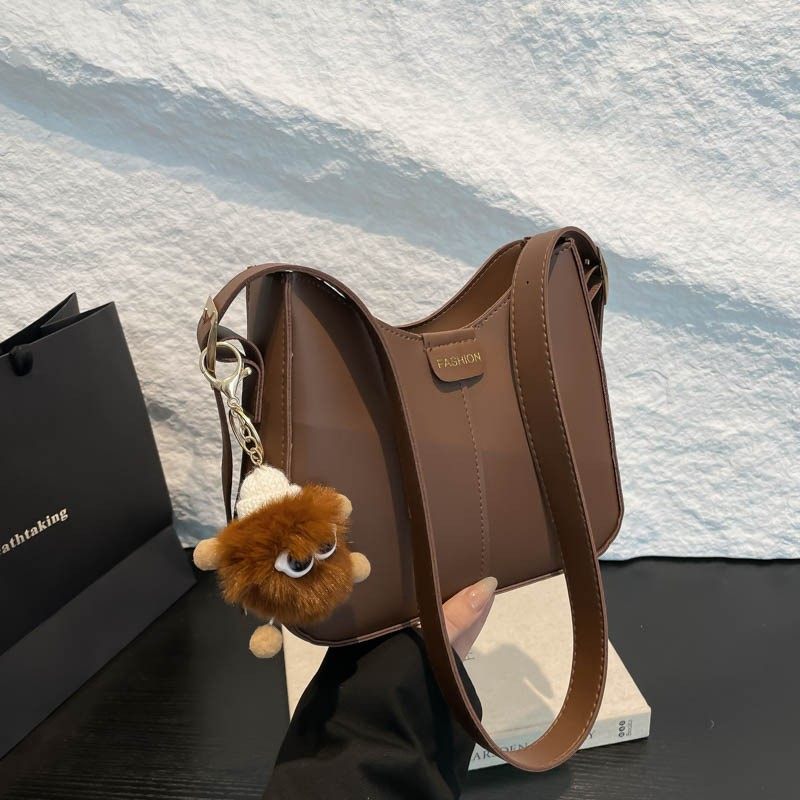 高级质感复古包包女式2025新款时尚百搭水桶包网红爆款单肩斜挎包,淘宝优惠券,粉丝福利购,淘宝优惠卷