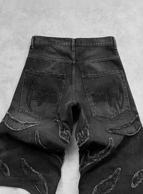 欧美简约复古黑色拼凑洞牛仔裤
