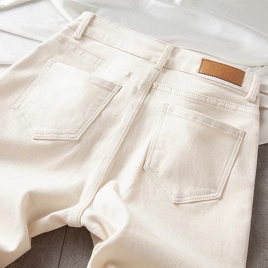 Beige cigarette straight jeans come with free shipping insurance
