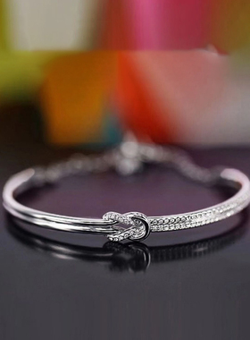 莫桑石群镶双排蝴蝶结手链银镀