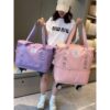 Women's large-capacity travel bag is waterproof and can be put on with a trolley for travel