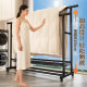 Floor standing double pole coat rack