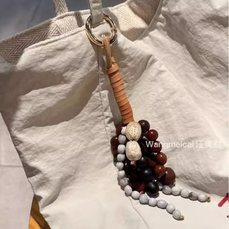 文淇同款包挂件满愿种子挂饰手工编织高级感挂件女2025新款发饰 - 图1