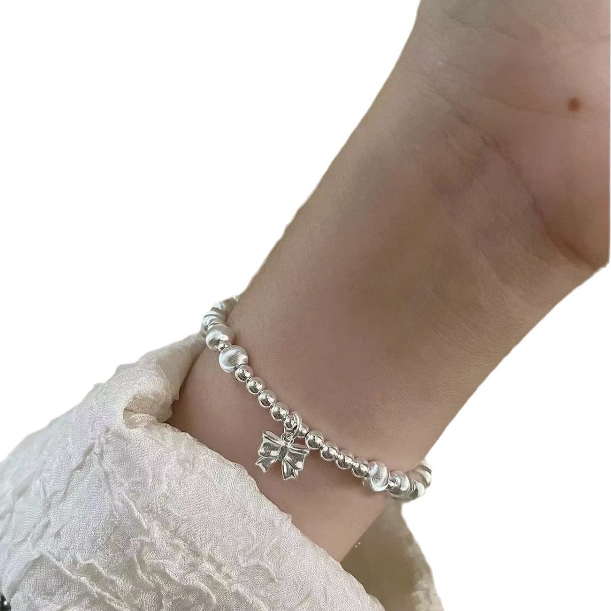 猫眼手链s925纯银蝴蝶结银珠手串女弹力绳转运珠手工简约小众手饰,淘宝优惠券,粉丝福利购,淘宝优惠卷