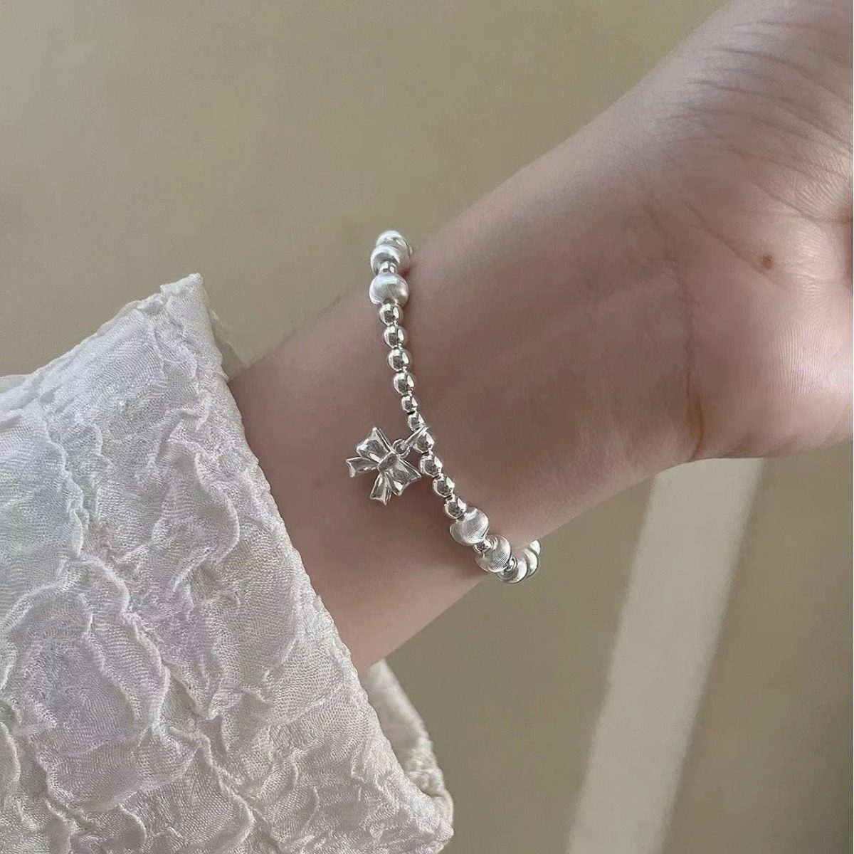 猫眼手链s925纯银蝴蝶结银珠手串女弹力绳转运珠手工简约小众手饰,淘宝优惠券,粉丝福利购,淘宝优惠卷