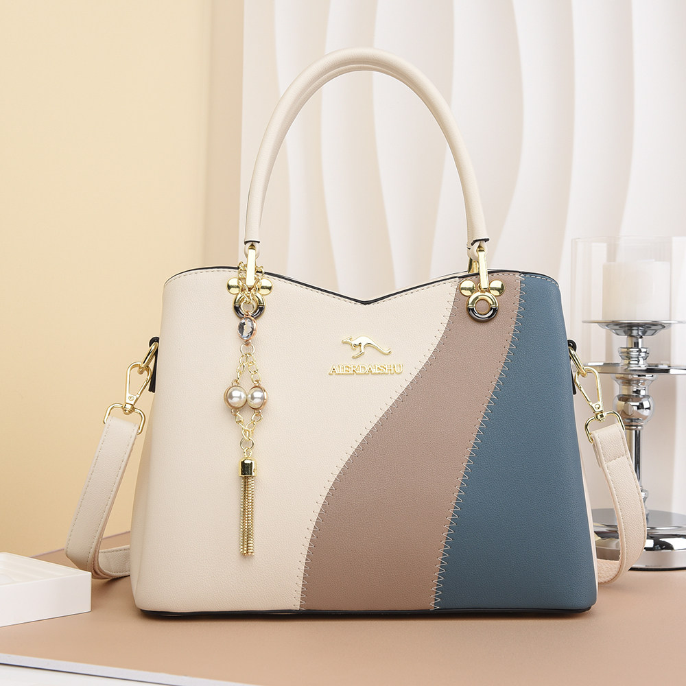 品牌袋鼠女包2025新款时尚大气单肩斜挎包大容量真皮手提包送妈妈,淘宝优惠券,粉丝福利购,淘宝优惠卷