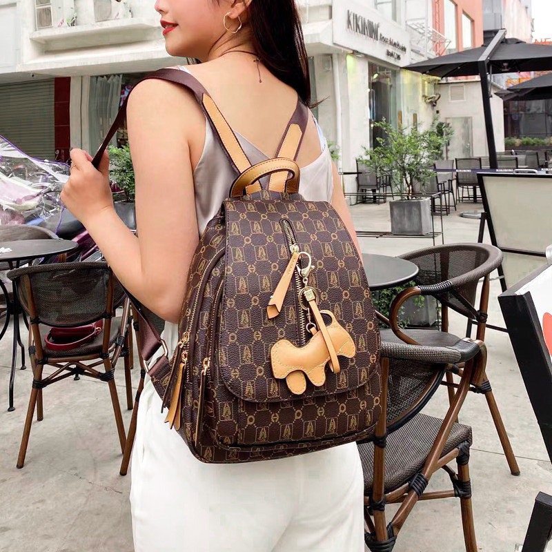 暇步士女包2021新款女士印花双肩包 暇步士摩天轮双肩背包