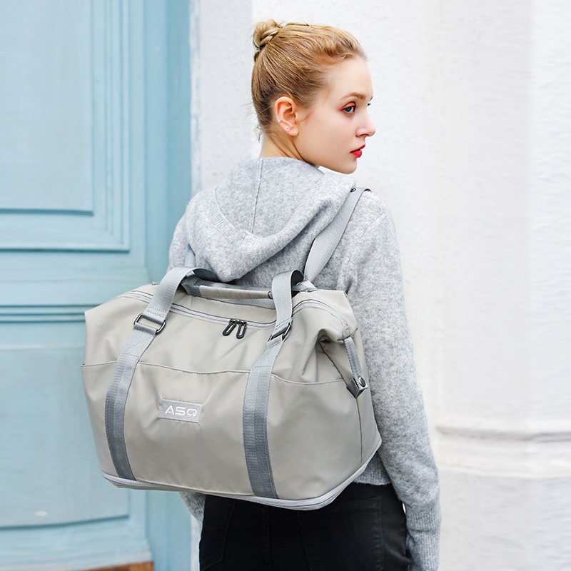 大容量男女手提轻便行李双肩背包 阿仕旗旅行袋