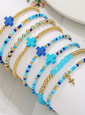 A simple rice bead elastic cross bracelet for ladies休闲手串