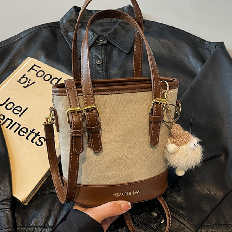 秋冬新款高级感手拎水桶包2025复古时尚休闲单肩包上班通勤斜挎包,淘宝优惠券,粉丝福利购,淘宝优惠卷