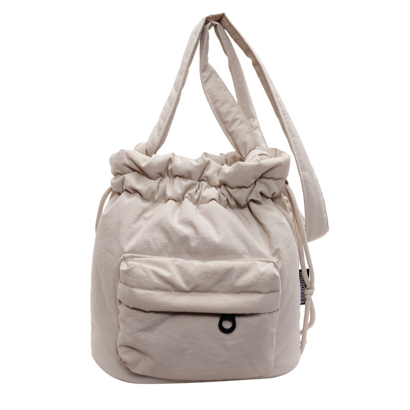 时尚休闲束口尼龙布水桶包女2025冬季新款韩版ins潮流百搭单肩包,淘宝优惠券,粉丝福利购,淘宝优惠卷