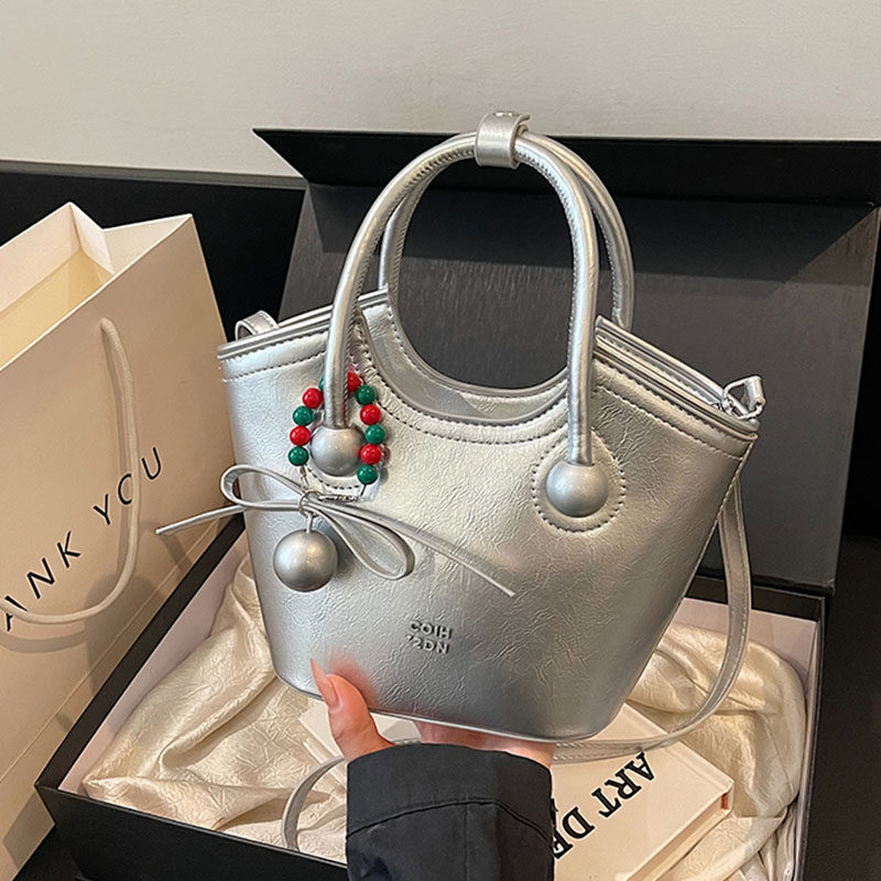 韩国ins潮流时尚手拎水桶包2025秋冬新款简约百搭单肩包休闲女包,淘宝优惠券,粉丝福利购,淘宝优惠卷