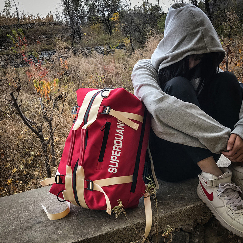 旅行大容量户外轻便防水男女登山包 仟仁狮双肩背包