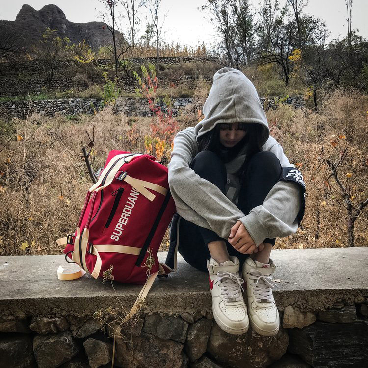 旅行大容量户外轻便防水男女登山包 仟仁狮双肩背包