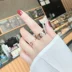 Nhẫn màu đỏ thắt chặt đánh vần hai trong một vòng tình yêu khác nhau nữ thép titan thời trang cá tính một cặp đôi thủy triều - Nhẫn nhan kim tien Nhẫn