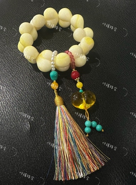 仟禧秋冬新品爆款奶白屁桃原创设计款手串女款高颜值琥珀流苏手串
