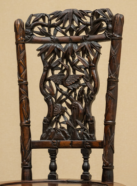 红木透雕仙鹤竹叶纹圆座靠背椅