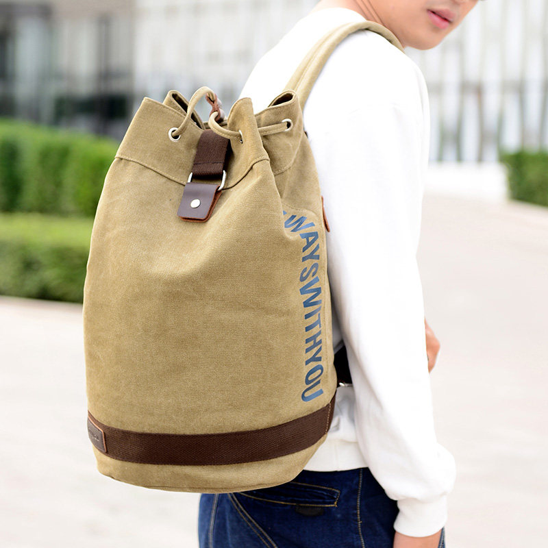 帆布水桶男包户外休闲大容量双肩包 魅诗特双肩背包