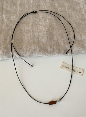 简约复古轻奢木纹吊坠黑绳项链女小众个性时尚精致百搭颈链毛衣链