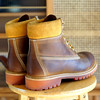 Elegant golden Chelsea boots