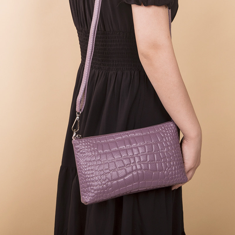 姿狄真皮手拿包女2020新款斜挎包 姿狄女士包袋