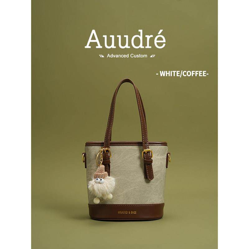 天锚国际时尚撞色手提水桶包包女2026新款春夏百搭洋派斜挎包通勤,淘宝优惠券,粉丝福利购,淘宝优惠卷