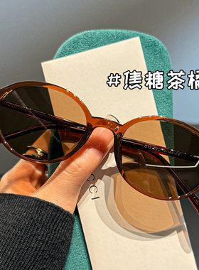 清冷感透灰书呆子风椭圆框墨镜女
