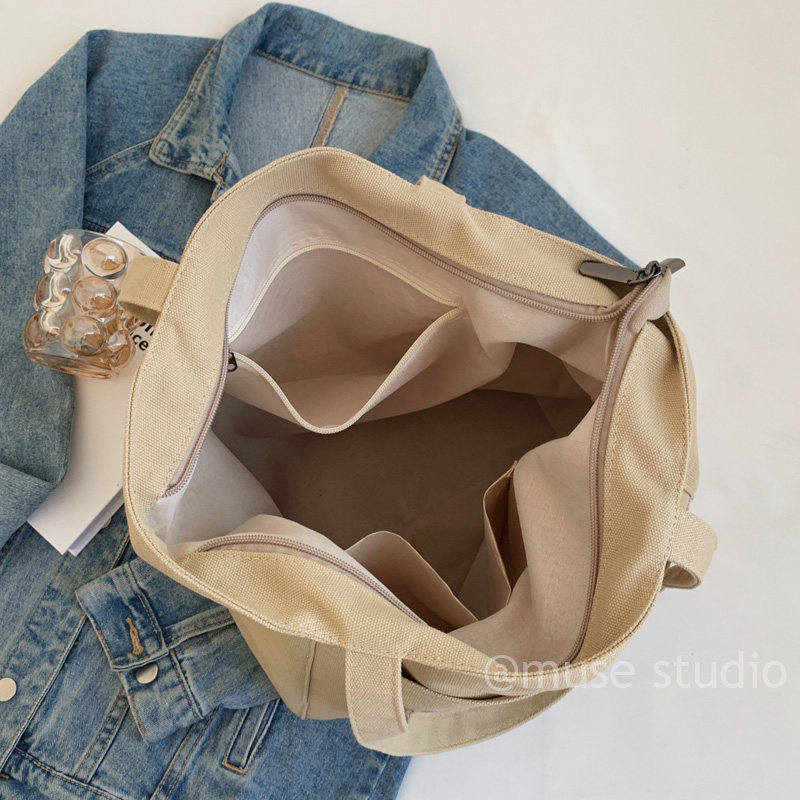 秋冬新款焦糖色帆布包女生简约单肩包容量量实用通勤手提托特包包,淘宝优惠券,粉丝福利购,淘宝优惠卷