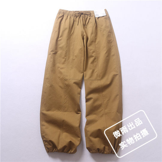 El seguro de envío está incluido y hay fotos reales de pantalones de mujer de primavera y otoño.