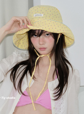 鹅黄色的夏天碎花系带渔夫帽盆帽