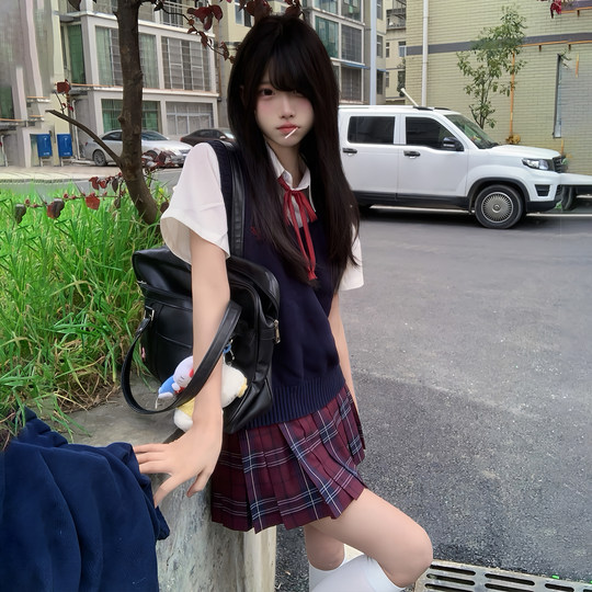 El nuevo producto de Hua Qian Zhu, Xiao Jie Zhong, chaleco multicolor JK