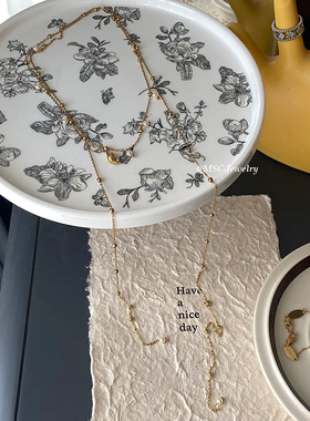 打结戴法海螺珍珠度假风长款项链