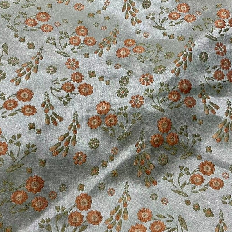 中国风小花朵水草提花面料 微括橘粉色织提花布缎面女装箱包布料,淘宝优惠券,粉丝福利购,淘宝优惠卷