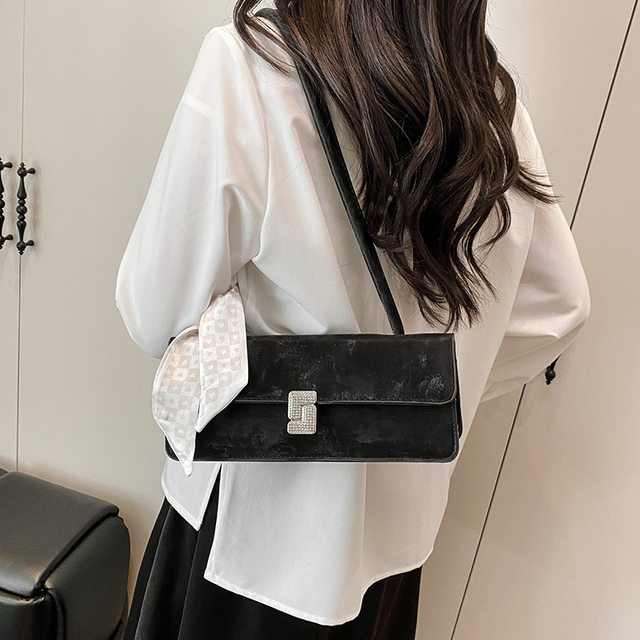 Textured niche design armpit baguette bag for women 2026 early spring new fashion silk scarf portable small square bag shoulder bag
