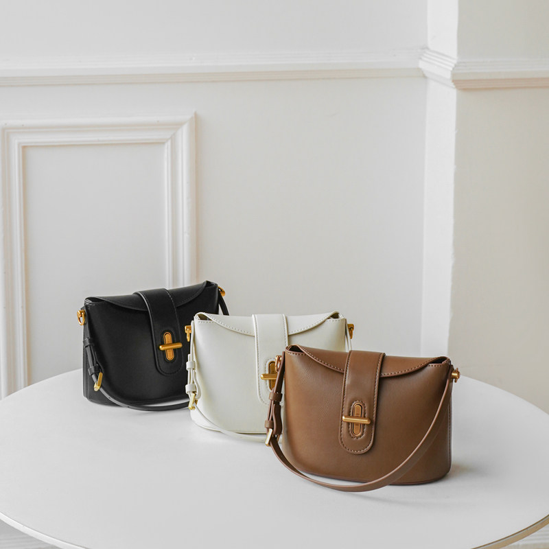 小众设计包包女2025新款时尚简约复古水桶包高级感通勤单肩斜挎包,淘宝优惠券,粉丝福利购,淘宝优惠卷