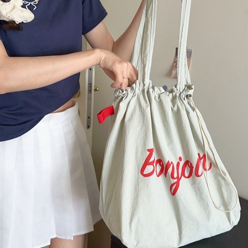 2025夏季新抽绳帆布包ins日系托特包上班通勤手提袋大容量单肩包,淘宝优惠券,粉丝福利购,淘宝优惠卷