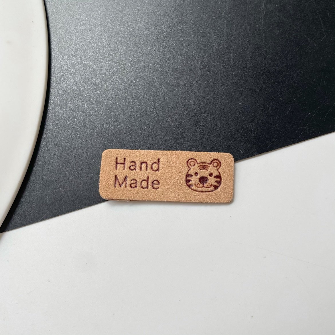 手工DIY毛线玩偶包包装饰皮标压花笑脸兔子图案皮革服装鞋包织唛,淘宝优惠券,粉丝福利购,淘宝优惠卷