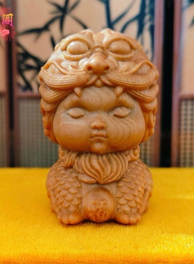 崖柏木雕麒麟龙头马上有钱摆件