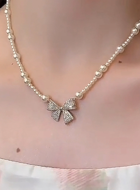 蝴蝶结吊坠珍珠项链女2025新款高级感法式锁骨链配饰轻奢小众颈链