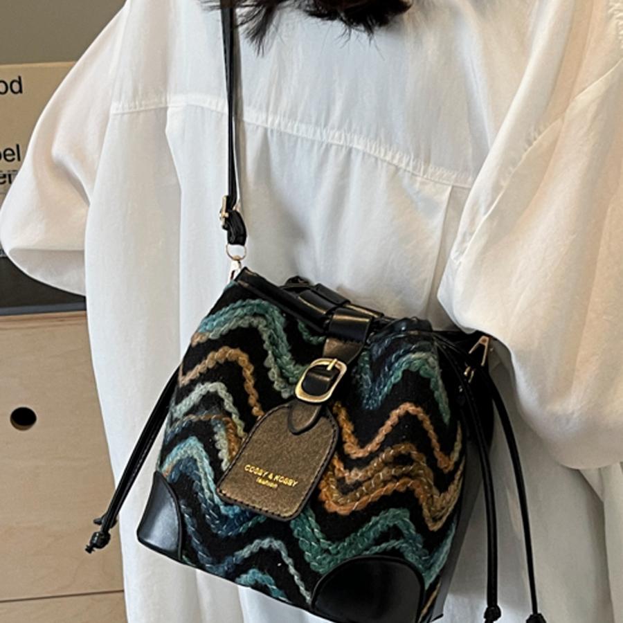 包包韩系高级感百搭水桶包春夏2025新款复古小众设计单肩斜挎包女 - 图1