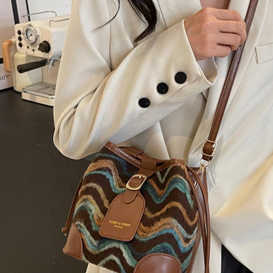 包包韩系高级感百搭水桶包春夏2025新款复古小众设计单肩斜挎包女 - 图0