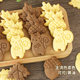 Chestnut biscuit cake decorated with squirrel maple leaf ornaments
