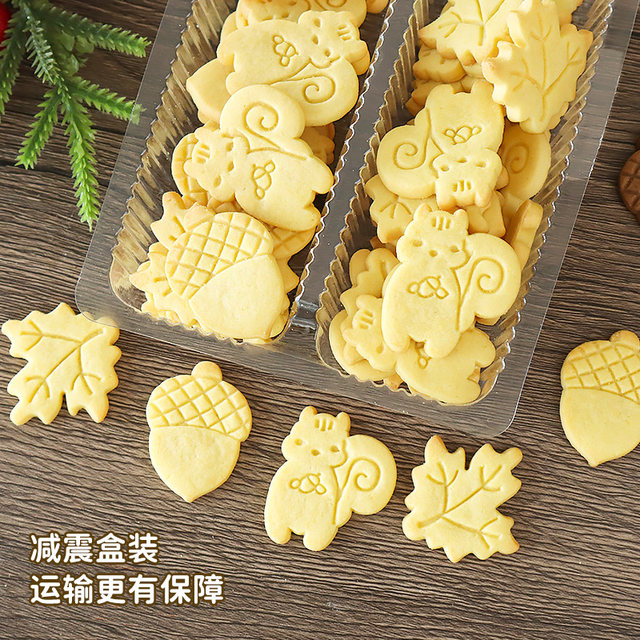 Chestnut biscuit cake decorated with squirrel maple leaf ornaments