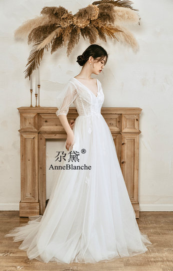 Light wedding dress designer elegant French sleeves with small tail