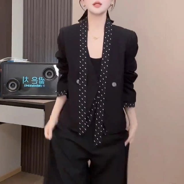 ເສື້ອເຊີດຄໍ V-neck ຜ່ອນຄາຍແບບເກົາຫຼີສໍາລັບແມ່ຍິງທີ່ມີໂບ